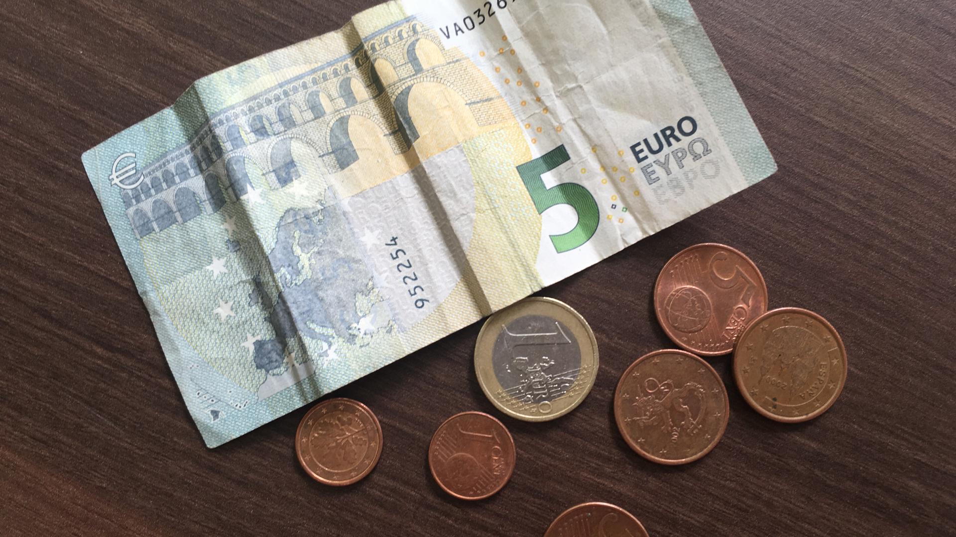 5 euro biljet en kleingeld